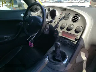 2007 Pontiac Solstice GXP z VIN 1G2MG35X07Y135497, wystawiony jako Copart lot #41842171 z przebiegiem 104 155 mil mil oraz Szkoda całkowita • Salvage title. Historia ofert i sprzedaży dostępna na DreamBid. Obrazek 9.