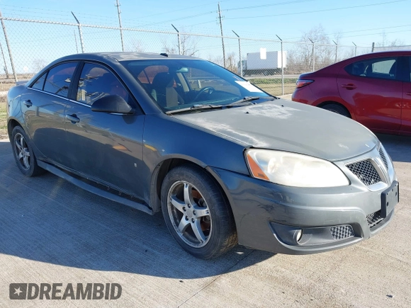 2009 Pontiac G6 1SB z VIN 1G2ZJ57K494248304, wystawiony jako IAAI lot #41649899 z przebiegiem 144 015 mil mil oraz . Historia ofert i sprzedaży dostępna na DreamBid. Obrazek 1.