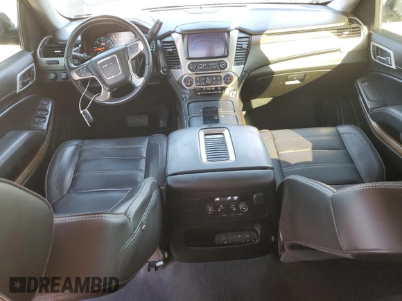 2019 GMC Yukon Denali with VIN 1GKS2CKJ9KR186604, listed as a Copart auction lot 82201124 with 110,069 mi miles and Salvage Title. Bid and sale history available at DreamBid. Image 8.