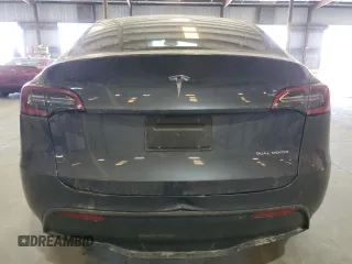 2023 Tesla Model Y Long Range z VIN 7SAYGDEE3PF862038, wystawiony jako Copart lot #57639325 z przebiegiem 11 020 mil mil oraz Szkoda całkowita • Salvage title. Historia ofert i sprzedaży dostępna na DreamBid. Obrazek 6.