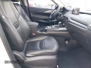 2016 Mazda CX-9 Sport z VIN JM3TCABY1G0111316, wystawiony jako IAAI lot #42085945 z przebiegiem 98 691 mil mil oraz . Historia ofert i sprzedaży dostępna na DreamBid. Obrazek 5.