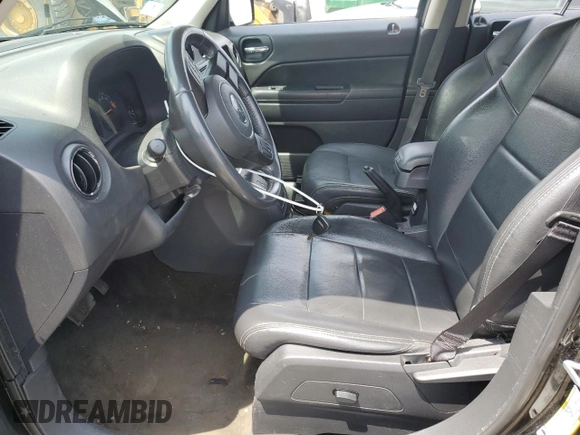 2015 Jeep Patriot High Altitude with VIN 1C4NJRFB8FD425628, listed as a Copart auction lot 61457875 with 150,441 mi miles and Clean title. Bid and sale history available at DreamBid. Image 7.