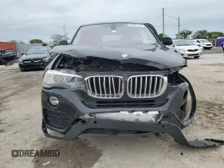 2015 BMW X4 xDrive28i with VIN 5UXXW3C51F0M88632, listed as a Copart auction lot 82401313 with 0 mi miles. Bid and sale history available at carsss.com. Image 5.