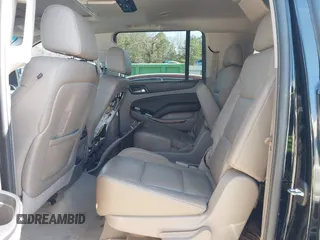 2015 Chevrolet Suburban LTZ with VIN 1GNSCKKC3FR249956, listed as a IAAI auction lot 41306605 with 122,942 mi miles and . Bid and sale history available at DreamBid. Image 8.