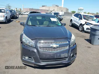 2013 Chevrolet Malibu LTZ with VIN 1G11J5SX6DF335333, listed as a IAAI auction lot 42135480 with 158,743 mi miles and . Bid and sale history available at DreamBid. Image 6.
