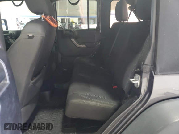 2016 Jeep Wrangler Unlimited Sport z VIN 1C4HJWDG4GL156724, wystawiony jako Copart lot #62733795 z przebiegiem 100 602 mil mil oraz Szkoda całkowita • Salvage title. Historia ofert i sprzedaży dostępna na DreamBid. Obrazek 11.