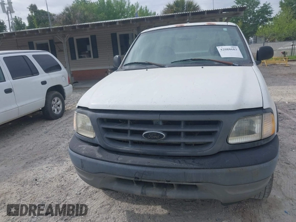 2003 Ford F-150 XL with VIN 2FTRF18W43CA95650, listed as a IAAI auction lot 42088683 with Not provided miles and . Bid and sale history available at DreamBid. Image 6.