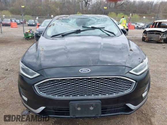 2020 Ford Fusion Titanium with VIN 3FA6P0D9XLR174523, listed as a IAAI auction lot 42100113 with 100,602 mi miles and . Bid and sale history available at DreamBid. Image 13.