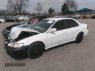2000 Honda Accord LX z VIN 1HGCG1649YA000482, wystawiony jako IAAI lot #41679083 z przebiegiem 147 209 mil mil oraz . Historia ofert i sprzedaży dostępna na DreamBid. Obrazek 2.