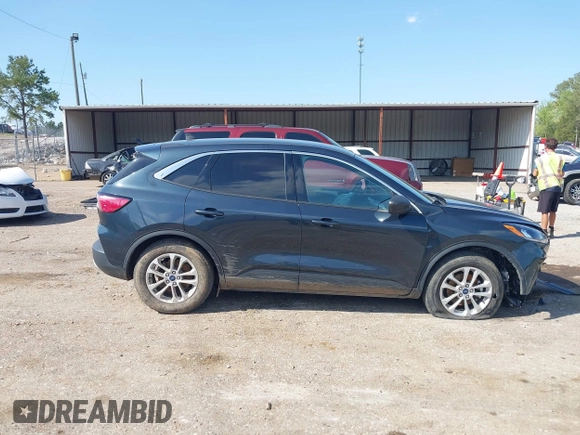 2022 Ford Escape SE with VIN 1FMCU0G62NUA04445, listed as a IAAI auction lot 42010517 with 44,855 mi miles and . Bid and sale history available at DreamBid. Image 14.