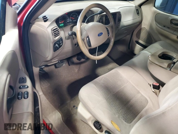 2003 Ford F-150 XL with VIN 1FTRF17W03NB26338, listed as a Copart auction lot 82484904 with 163,992 mi miles and Salvage Title. Bid and sale history available at DreamBid. Image 8.