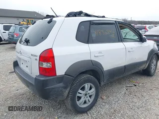 2006 Hyundai Tucson GLS with VIN KM8JN72D26U322893, listed as a IAAI auction lot 41882842 with 116,972 mi miles. Bid and sale history available at carsss.com. Image 4.