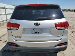 2017 Kia Sorento LX z VIN 5XYPGDA3XHG236574, wystawiony jako Copart lot #56359835 z przebiegiem 105 297 mil mil oraz Szkoda całkowita • Salvage title. Historia ofert i sprzedaży dostępna na DreamBid. Obrazek 6.