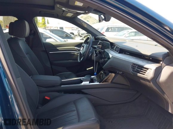 2022 Audi e-tron Premium Plus with VIN WA1LAAGE1NB008616, listed as a IAAI auction lot 42723244 with 36,800 mi miles and . Bid and sale history available at DreamBid. Image 5.