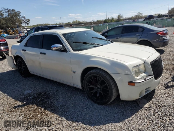 2005 Chrysler 300 with VIN 2C3AA63H35H504149, listed as a Copart auction lot 46455655 with 128,617 mi miles and Salvage Title. Bid and sale history available at carsss.com. Image 4.