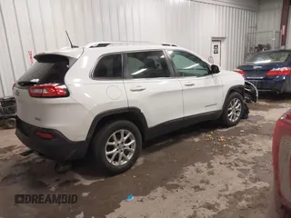 2016 Jeep Cherokee Latitude with VIN 1C4PJMCB1GW119621, listed as a IAAI auction lot 41310872 with 123,841 mi miles. Bid and sale history available at carsss.com. Image 4.