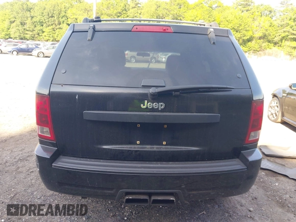 2005 Jeep Grand Cherokee Laredo z VIN 1J4GR48K65C725099, wystawiony jako IAAI lot #42509223 z przebiegiem 249 216 mil mil oraz . Historia ofert i sprzedaży dostępna na DreamBid. Obrazek 17.