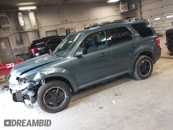 2011 Ford Escape XLT with VIN 1FMCU0D70BKB25088, listed as a IAAI auction lot 42004191 with 200,665 mi miles. Bid and sale history available at carsss.com. Image 17.
