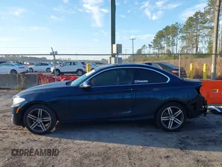 2017 BMW 2 Series 230i with VIN WBA2F9C3XHV983993, listed as a IAAI auction lot 41790242 with 76,620 mi miles. Bid and sale history available at carsss.com. Image 15.