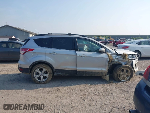 2014 Ford Escape SE with VIN 1FMCU9G96EUB25154, listed as a IAAI auction lot 42417612 with 176,916 mi miles and . Bid and sale history available at DreamBid. Image 13.