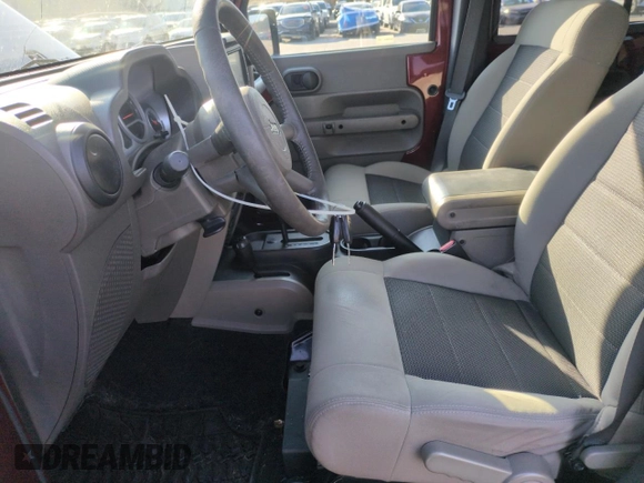 2010 Jeep Wrangler Unlimited Rubicon with VIN 1J4BA6H13AL140902, listed as a Copart auction lot 54335455 with 118,423 mi miles and Clean title. Bid and sale history available at DreamBid. Image 7.