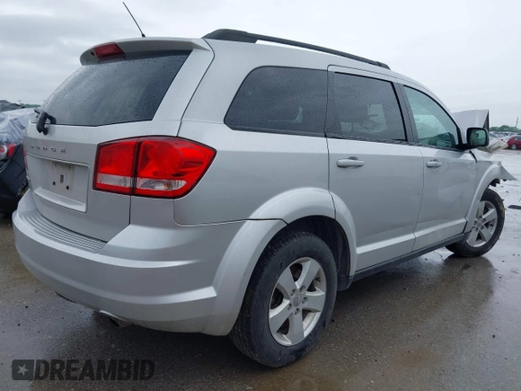2013 Dodge Journey Canada Value z VIN 3C4PDCABXDT563439, wystawiony jako IAAI lot #42227899 z przebiegiem 213 199 mil mil oraz . Historia ofert i sprzedaży dostępna na DreamBid. Obrazek 4.