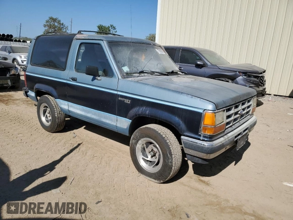 1990 Ford Bronco z VIN 1FMCU12T2LUA31399, wystawiony jako Copart lot #77099614 z przebiegiem 85 663 mil mil oraz Szkoda całkowita • Salvage title. Historia ofert i sprzedaży dostępna na DreamBid. Obrazek 4.