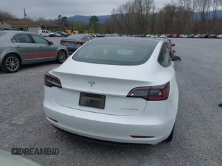 2021 Tesla Model 3 Long Range with VIN 5YJ3E1EBXMF980102, listed as a IAAI auction lot 41944364 with 48,766 mi miles and . Bid and sale history available at carsss.com. Image 16.