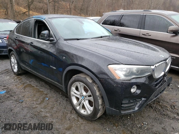 2015 BMW X4 xDrive28i with VIN 5UXXW3C54F0M89256, listed as a Copart auction lot 41388973 with 136,359 mi miles. Bid and sale history available at carsss.com. Image 4.