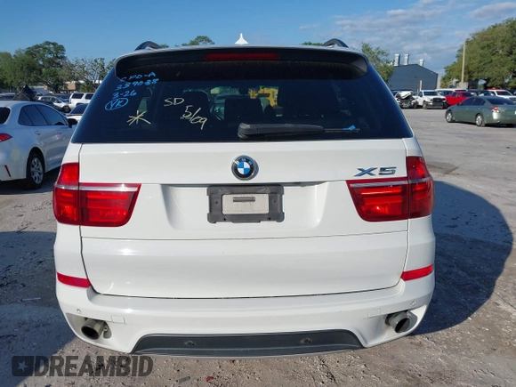 2011 BMW X5 35i with VIN 5UXZV4C52BL410497, listed as a IAAI auction lot 41995459 with 162,781 mi miles. Bid and sale history available at carsss.com. Image 16.