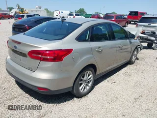 2015 Ford Focus SE с VIN 1FADP3F27FL376151, выставлен на аукционе IAAI как лот 42388275 с пробегом 138 947 миль миль и . История ставок и продаж доступна на DreamBid. Изображение 4.