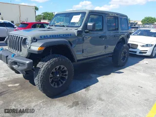 2022 Jeep Wrangler 4xe Unlimited Rubicon with VIN 1C4JJXR62NW189370, listed as a IAAI auction lot 42043547 with 38,277 mi miles. Bid and sale history available at carsss.com. Image 17.