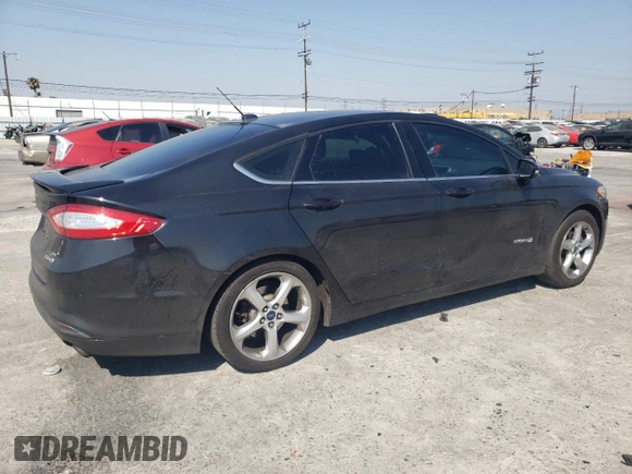 2014 Ford Fusion SE Hybrid with VIN 3FA6P0LUXER296906, listed as a Copart auction lot 62265414 with 135,332 mi miles and Salvage title. Bid and sale history available at DreamBid. Image 3.
