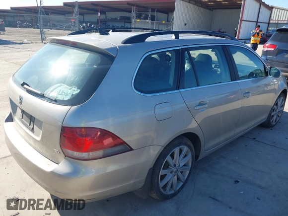 2012 Volkswagen Jetta SportWagen TDI with VIN 3VWPL7AJ8CM696238, listed as a IAAI auction lot 41369436 with 200,070 mi miles. Bid and sale history available at carsss.com. Image 4.