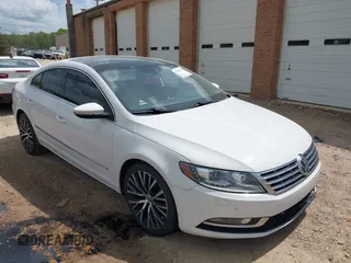 2014 Volkswagen CC Executive z VIN WVWGU7ANXEE507486, wystawiony jako IAAI lot #41943516 z przebiegiem 148 796 mil mil oraz . Historia ofert i sprzedaży dostępna na DreamBid. Obrazek 1.