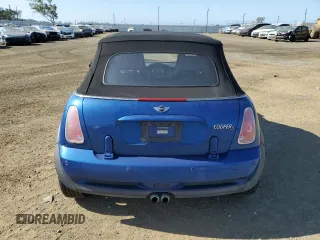 2005 MINI Convertible S z VIN WMWRH33565TK56154, wystawiony jako Copart lot #55860025 z przebiegiem 59 672 mil mil oraz Szkoda całkowita • Salvage title. Historia ofert i sprzedaży dostępna na DreamBid. Obrazek 6.