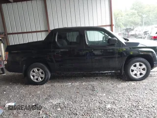 2007 Honda Ridgeline RTL with VIN 2HJYK16547H549241, listed as a IAAI auction lot 42282477 with 214,685 mi miles and . Bid and sale history available at DreamBid. Image 13.