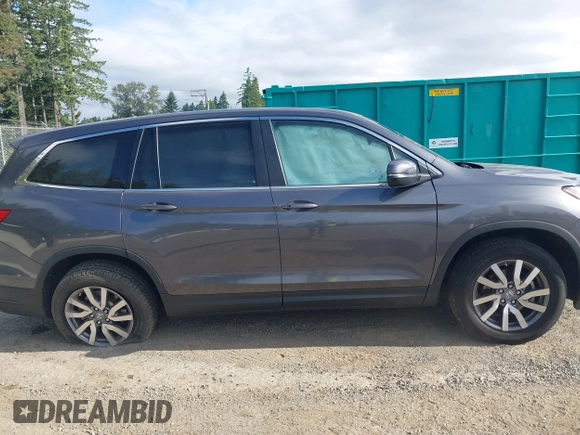 2019 Honda Pilot EX-L with VIN 5FNYF6H52KB035504, listed as a IAAI auction lot 42642735 with 54,736 mi miles and . Bid and sale history available at DreamBid. Image 13.