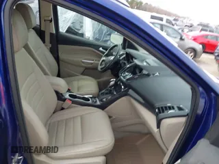 2016 Ford Escape Titanium with VIN 1FMCU9JXXGUA71898, listed as a IAAI auction lot 41758284 with 51,935 mi miles. Bid and sale history available at carsss.com. Image 5.