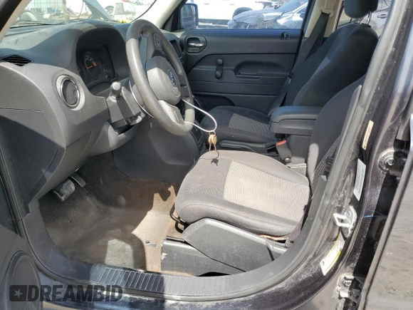 2014 Jeep Patriot Sport with VIN 1C4NJPBB6ED886934, listed as a Copart auction lot 62961255 with 118,080 mi miles and Clean title. Bid and sale history available at DreamBid. Image 7.