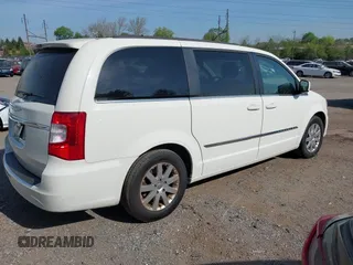 2013 Chrysler Town & Country Touring with VIN 2C4RC1BG9DR744836, listed as a IAAI auction lot 42104087 with 159,482 mi miles. Bid and sale history available at carsss.com. Image 4.