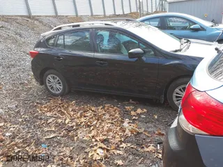 2017 Subaru Impreza Premium with VIN 4S3GTAB69H3704625, listed as a IAAI auction lot 41864611 with 71,352 mi miles. Bid and sale history available at carsss.com. Image 1.