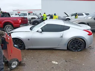 2010 Nissan 370Z Touring z VIN JN1AZ4EH9AM503264, wystawiony jako IAAI lot #42180901 z przebiegiem Nie podano mil oraz . Historia ofert i sprzedaży dostępna na DreamBid. Obrazek 14.