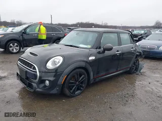 2018 MINI Hardtop 4 Door Cooper S with VIN WMWXU3C58J2F51097, listed as a IAAI auction lot 41567892 with 133542 miles. Bid and sale history available at carsss.com. Image 16.