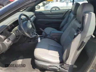 2006 Chrysler Sebring Touring z VIN 1C3EL55R86N282647, wystawiony jako Copart lot #56222535 z przebiegiem 126 385 mil mil oraz Szkody całkowita. Historia ofert i sprzedaży dostępna na DreamBid. Obrazek 7.