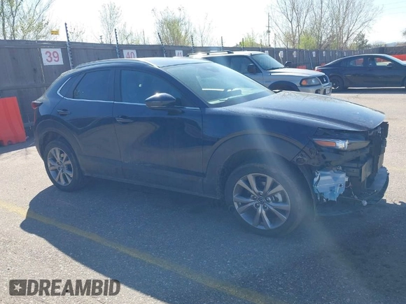 2024 Mazda CX-30 2.5 S Carbon Edition with VIN 3MVDMBCMXRM604020, listed as a IAAI auction lot 42042155 with 24,545 mi miles. Bid and sale history available at carsss.com. Image 1.