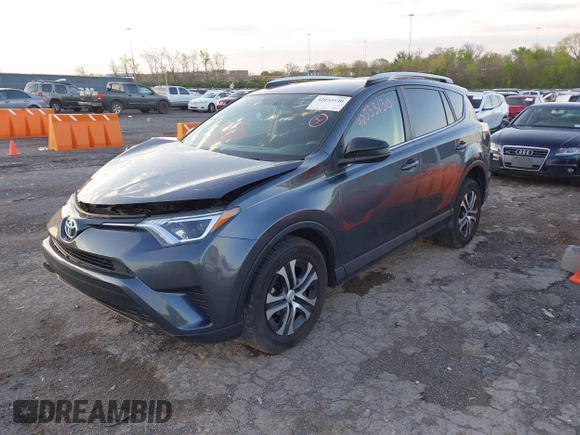 2016 Toyota RAV4 LE with VIN JTMBFREV1GD187414, listed as a IAAI auction lot 42033130 with 123,955 mi miles and . Bid and sale history available at carsss.com. Image 17.