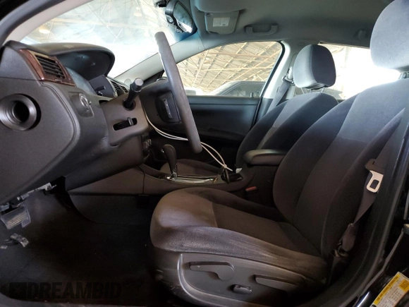 2015 Chevrolet Impala LS with VIN 2G1WA5E37F1158008, listed as a Copart auction lot 61977635 with 106,437 mi miles and Salvage title. Bid and sale history available at DreamBid. Image 7.