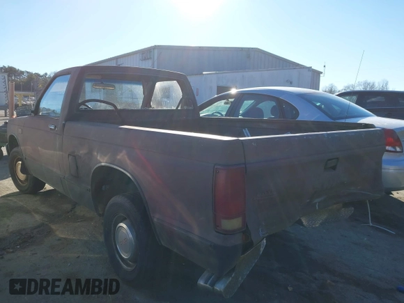 1986 GMC Sonoma with VIN 1GTBS14EXG2502284, listed as a IAAI auction lot 41273610 with 154,805 mi miles and . Bid and sale history available at DreamBid. Image 3.