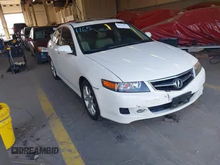 2006 Acura TSX Navi z VIN JH4CL96996C011003, wystawiony jako IAAI lot #42021469 z przebiegiem 227 473 mil mil oraz . Historia ofert i sprzedaży dostępna na DreamBid. Obrazek 1.